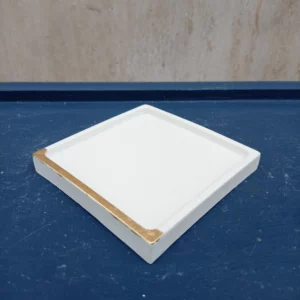 Vide-poches en béton blanc, pointé d'or